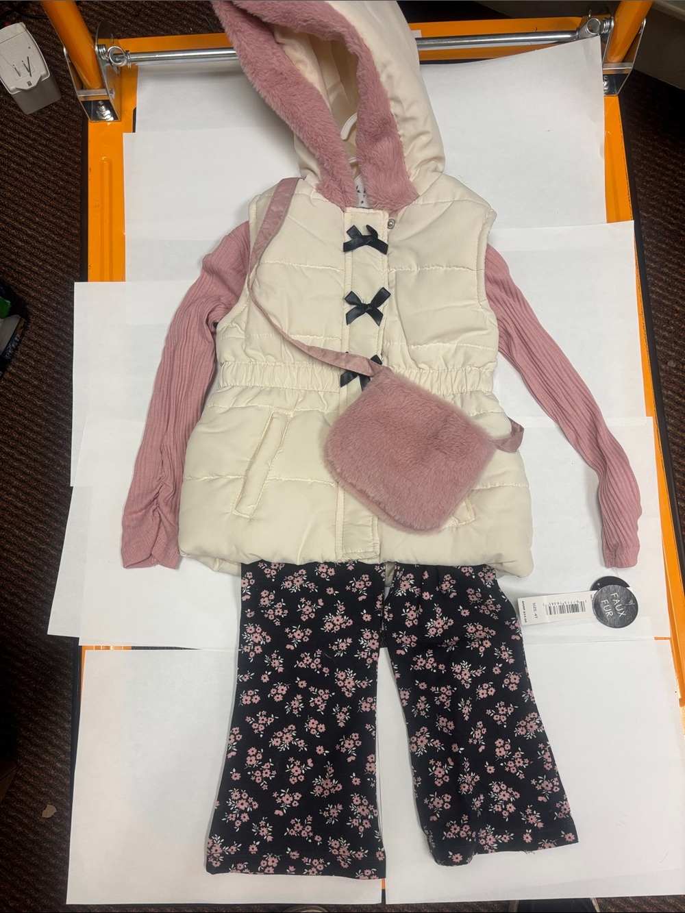 Girls Pink & Cream Puffer Vest Outfit with Floral Pants and small bag
